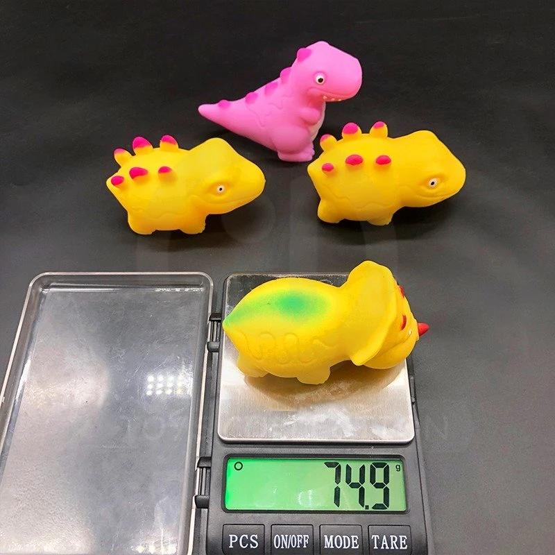 squeeze dino. toy(5)