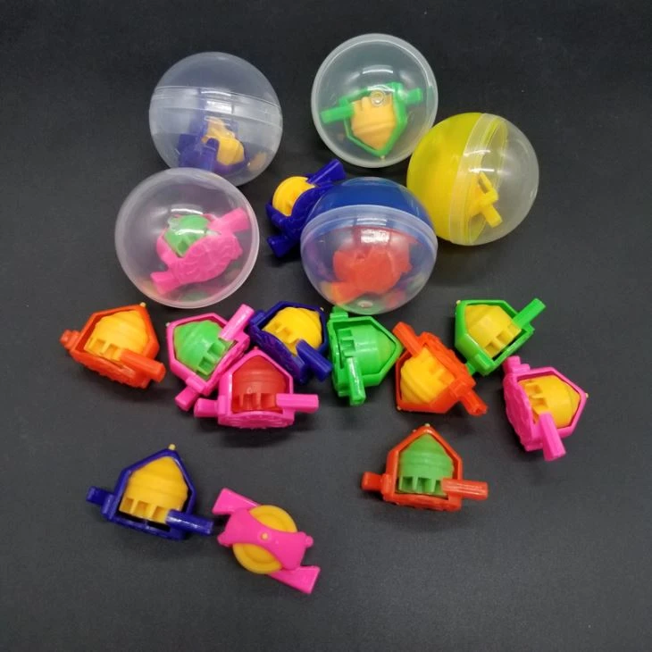 Plastic Spinning Top With Whistle For Capsule